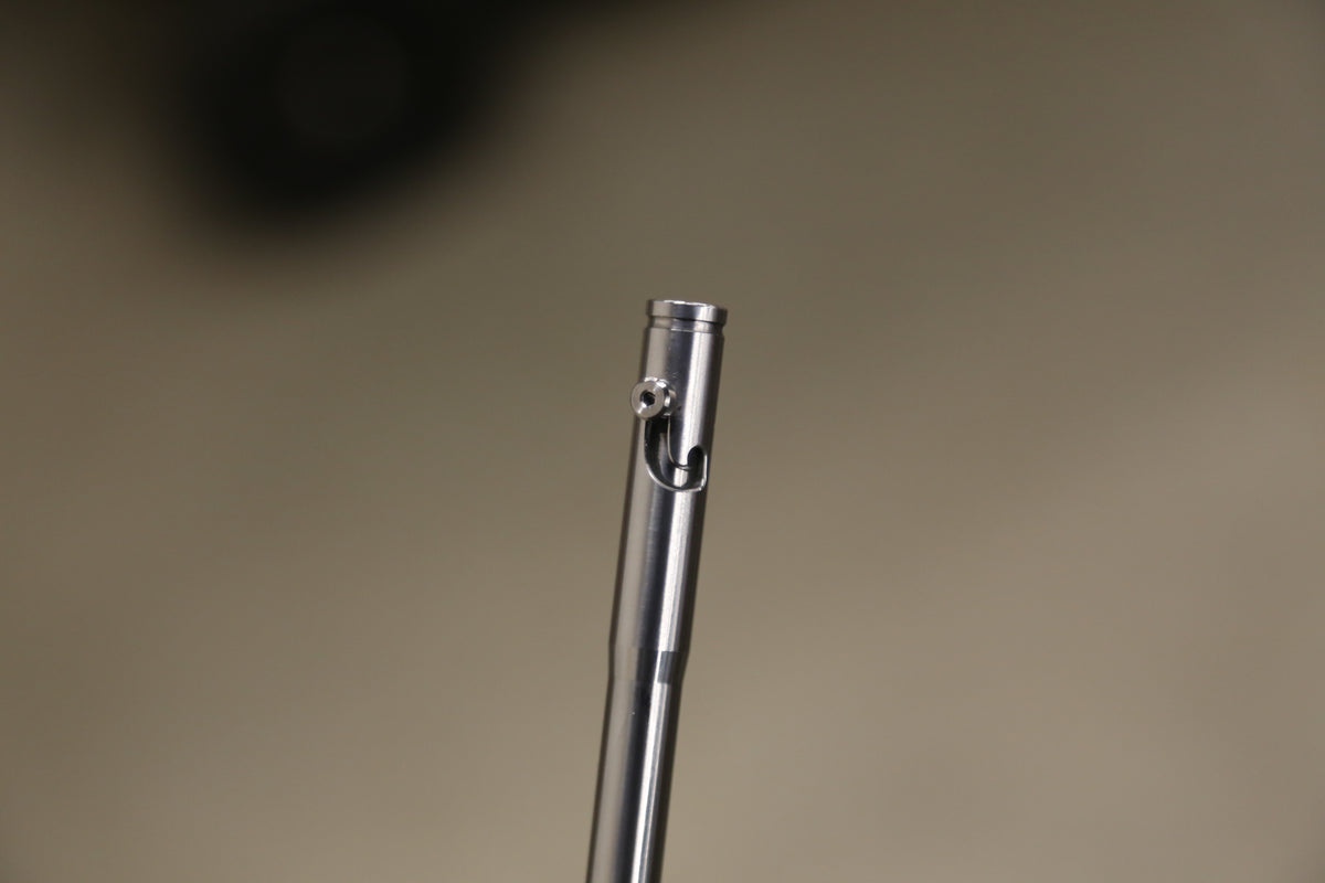 Close-up of the Drift pen’s bolt-action slot and thumb screw.