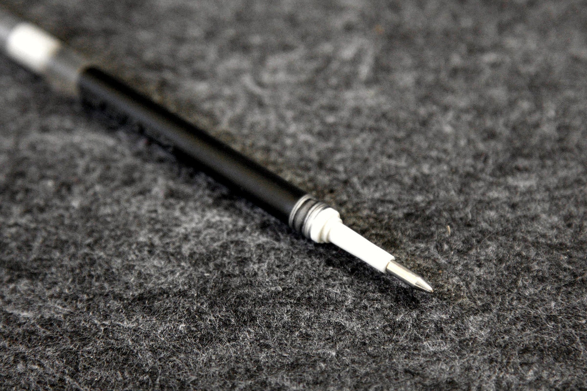 Close-up of a standard metal-tip 0.70 mm Pentel EnerGel refill.