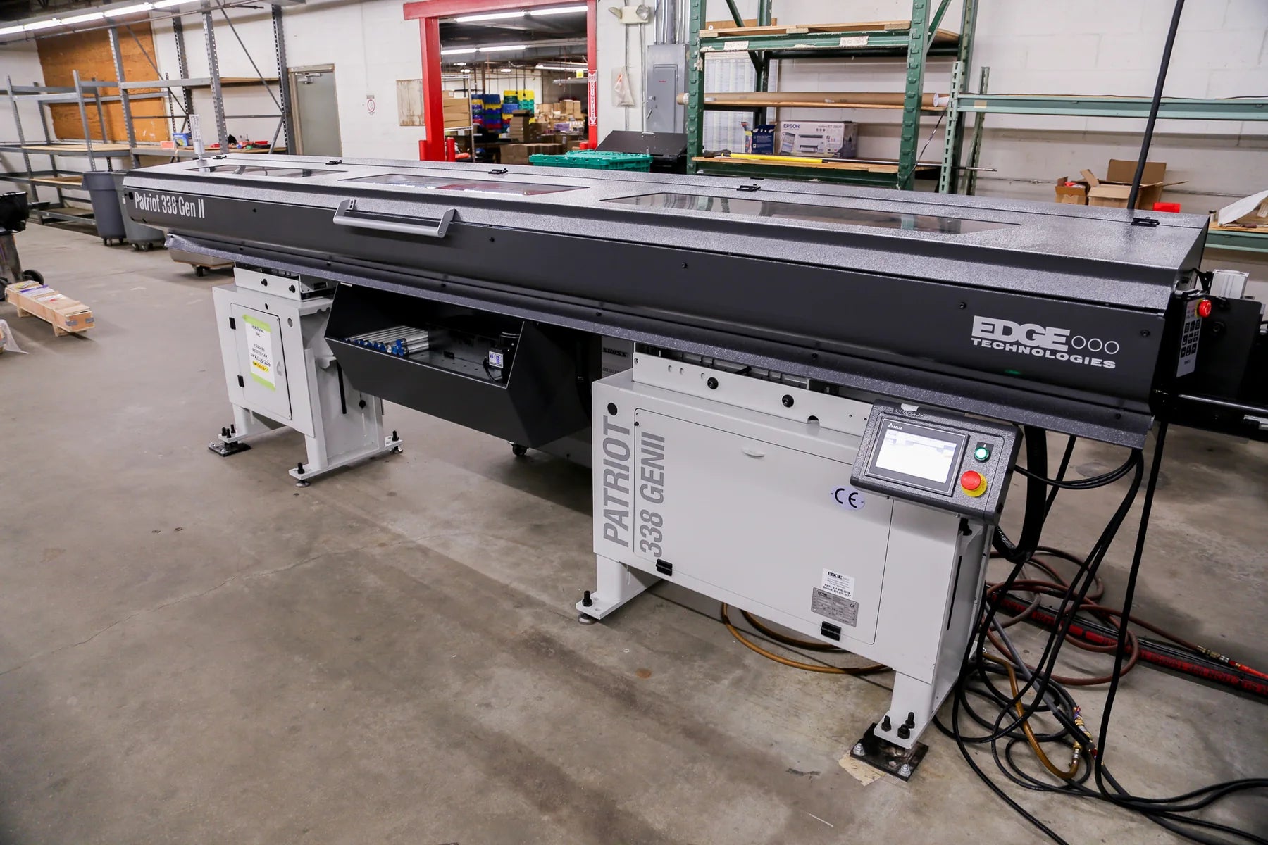 Automatic bar feeder supplying material to the Swiss CNC lathe